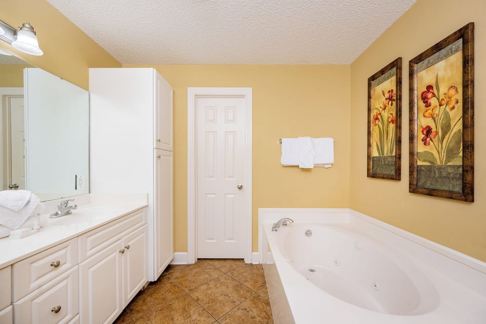 Indulge in a tranquil soak in the jetted tub in the master, surrounded by soothing decor and a calming vibe
