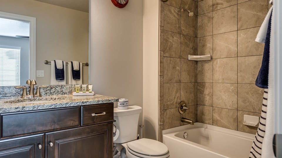Second Master bathroom with tub and shower combo