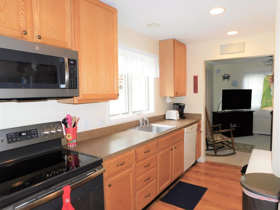 451 D Garfield Pkwy - Kitchen Workspace - Close-up of the kitchen counters highlighting the microwave and coffee maker.