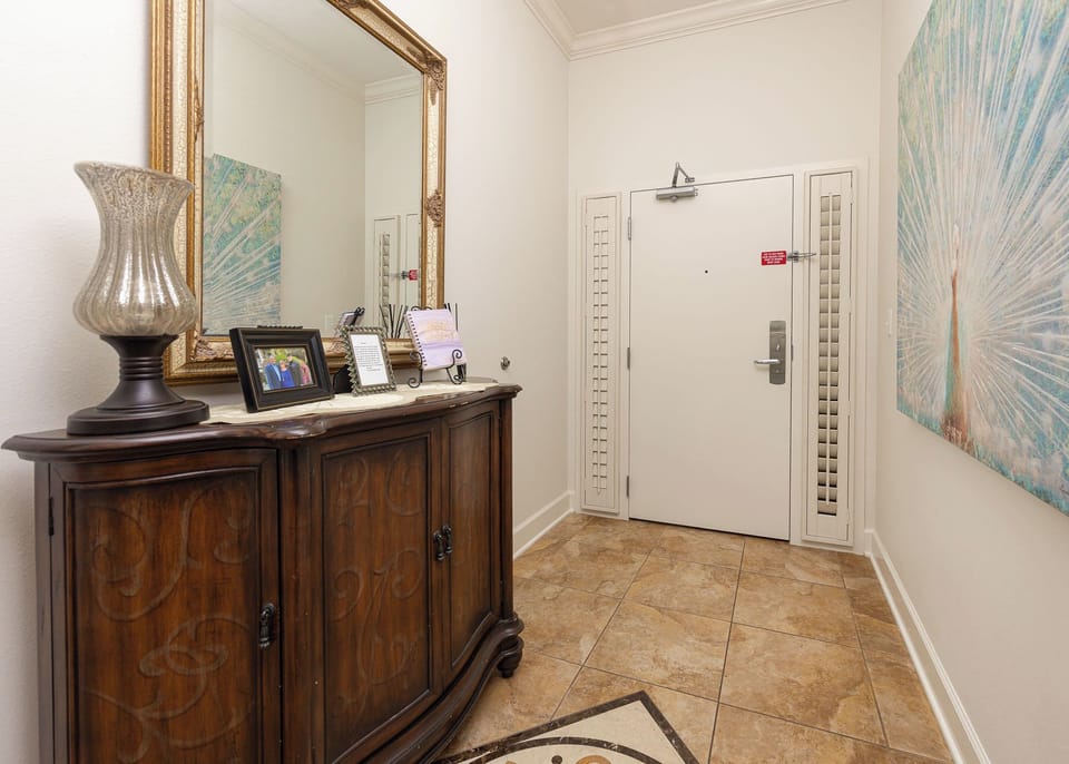 Step into a warm welcome with personal touches and cozy decor that sets the tone for your beach getaway