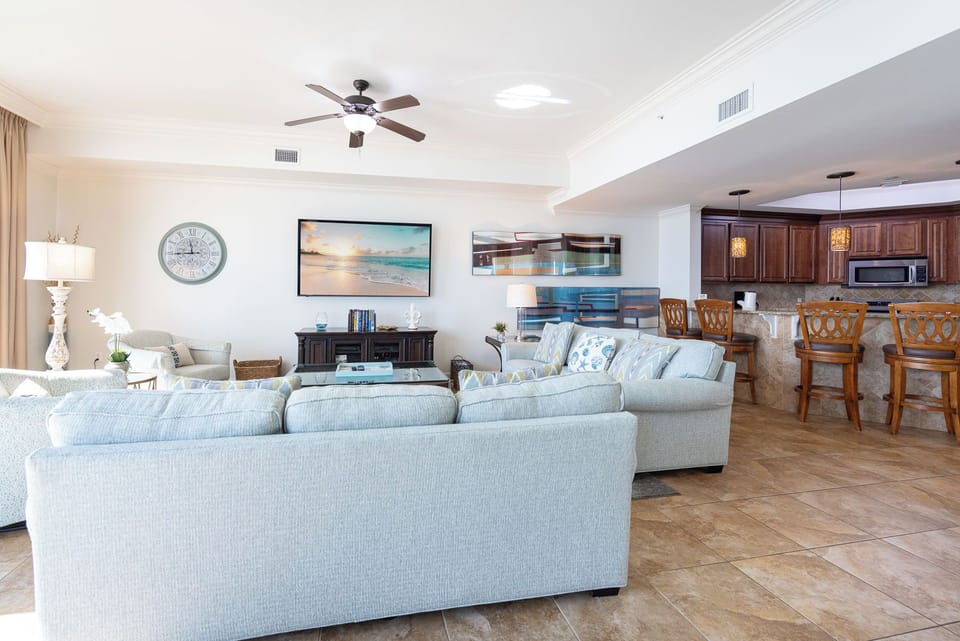 Relax on the sofa with a queen sleeper, enjoying favorite shows while soaking in the coastal vibe of your getaway
