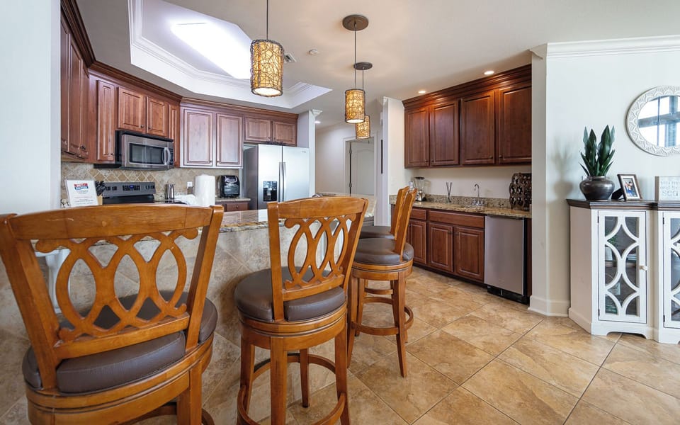 Gather at the breakfast bar to sip your morning coffee while taking in the cozy coastal vibe of your vacation spot