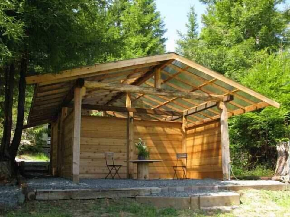 Bathhouse BBQ and covered lounge area