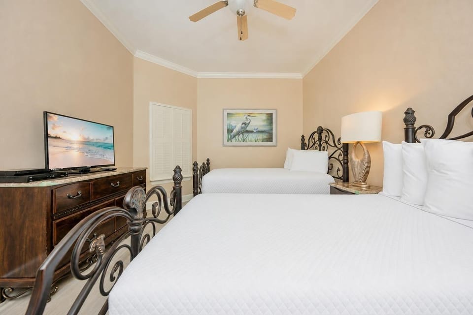 Drift into comfort on two queen beds while enjoying your favorite shows streaming on the TV in this cozy guest retreat