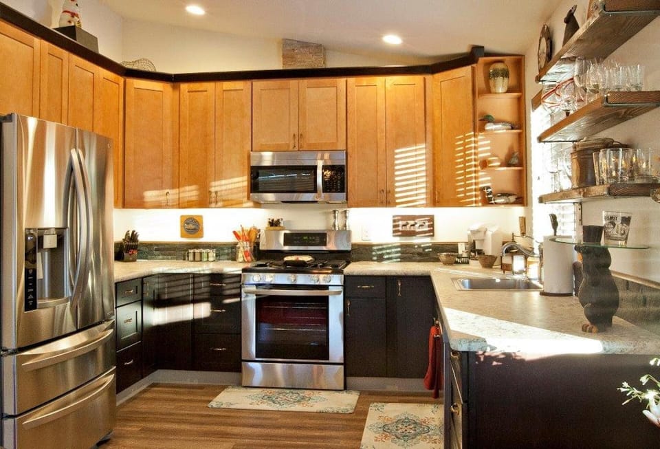 Updated kitchen with brand new appliances and including cookware, coffee maker
