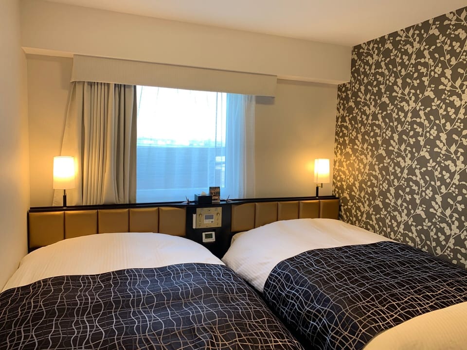 Down comforters, desk, WiFi (free)
