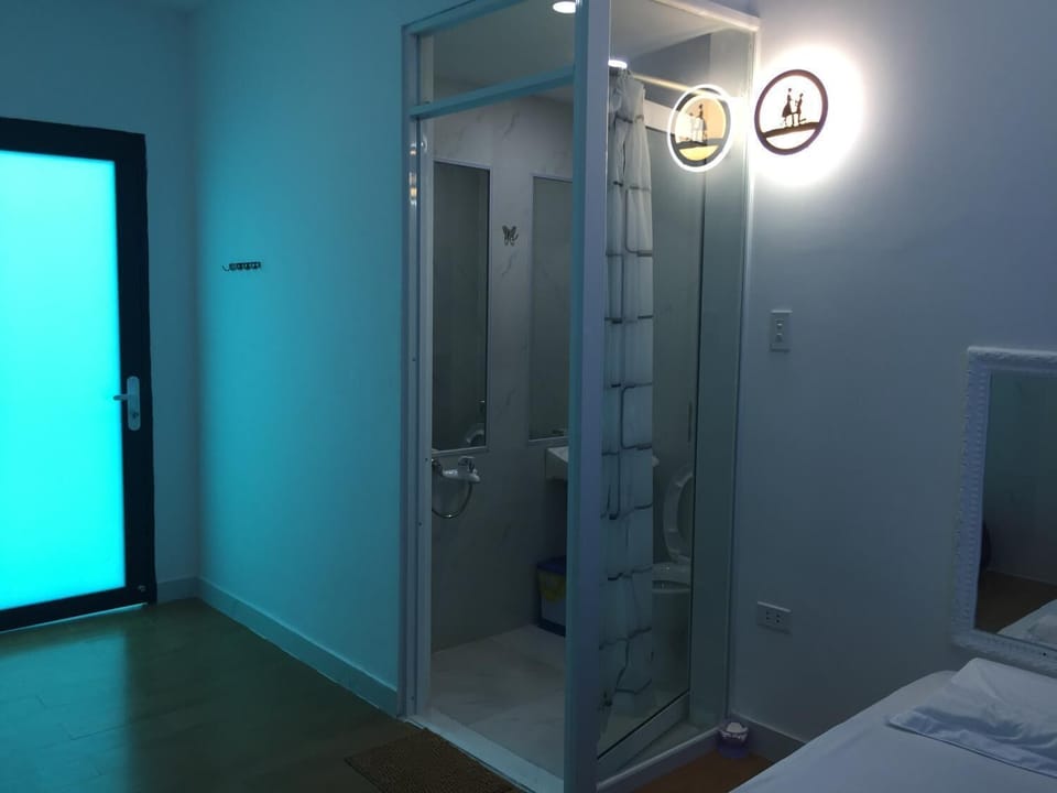 Shower, free toiletries, hair dryer, slippers