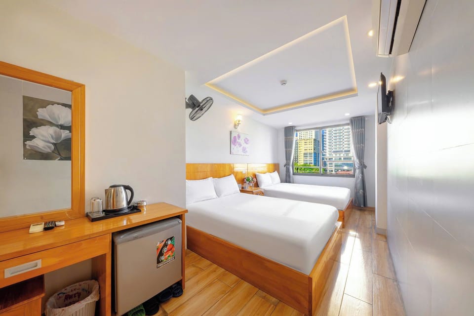Deluxe Double Room, City View | Minibar, desk, iron/ironing board, free WiFi