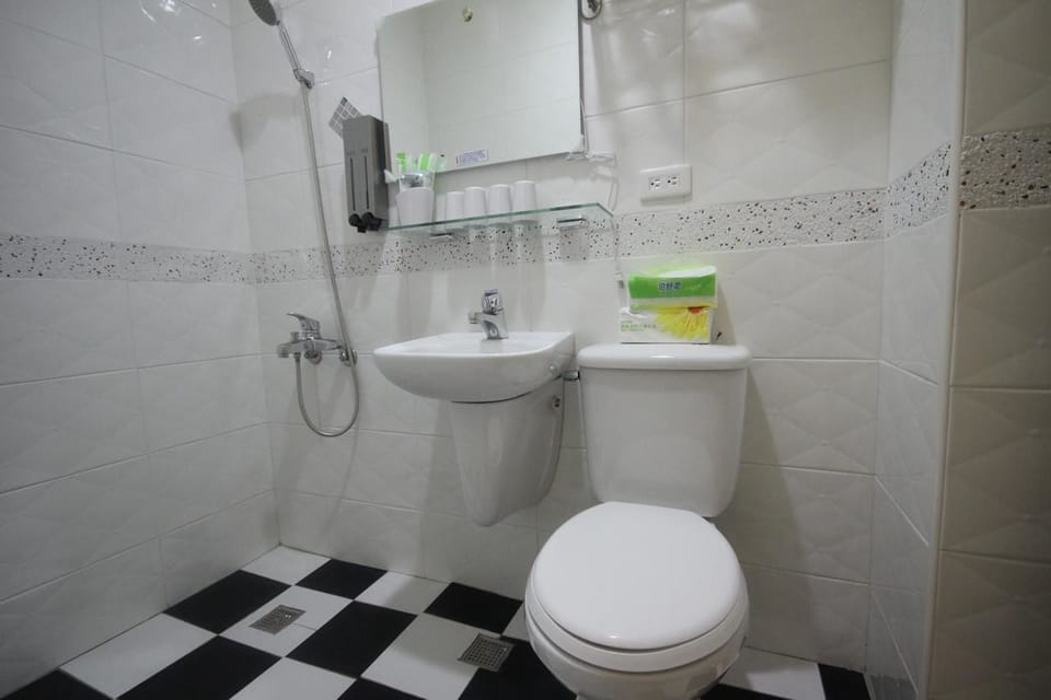Shower, free toiletries, hair dryer, slippers