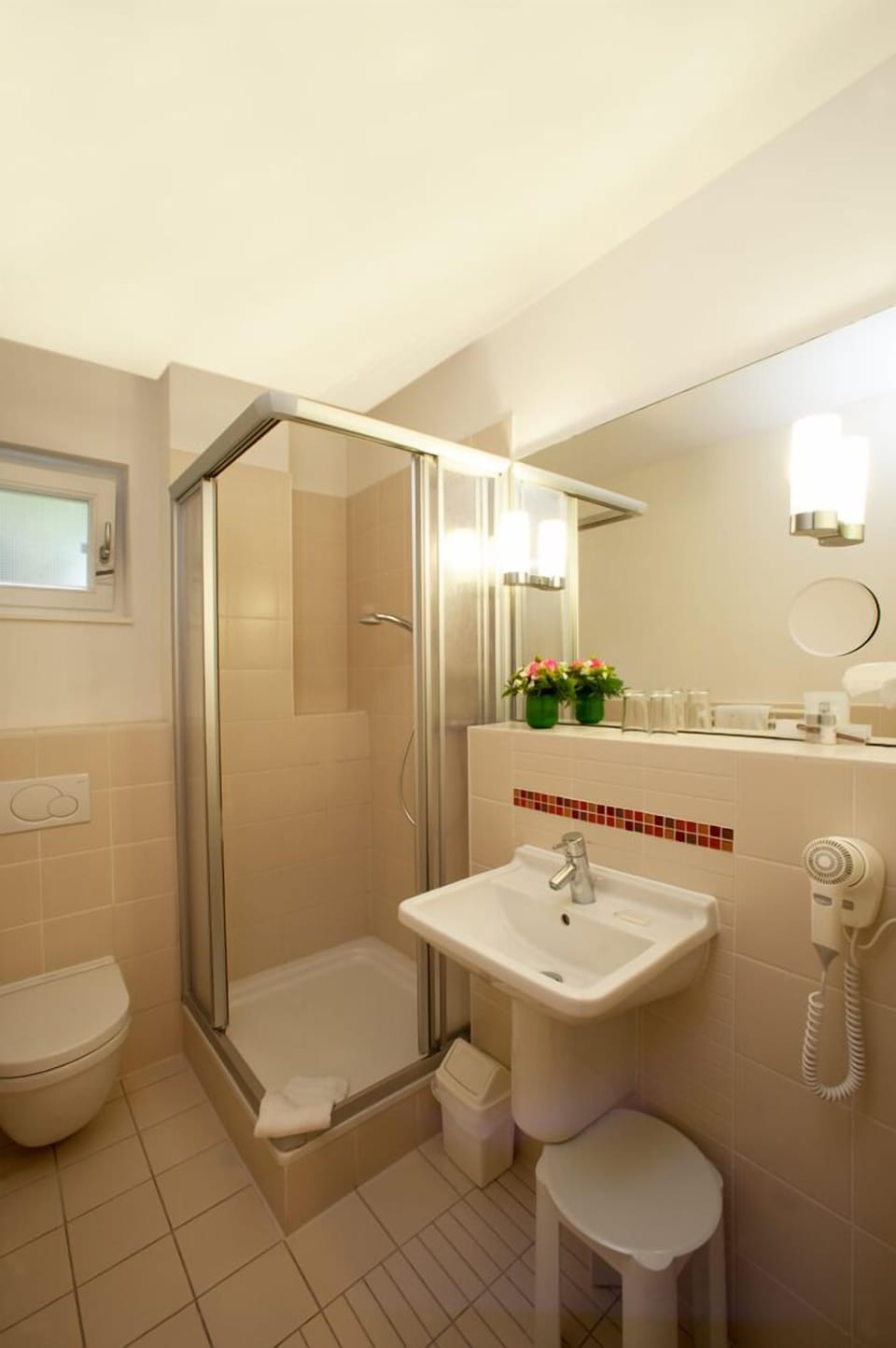 Shower, free toiletries, hair dryer, towels