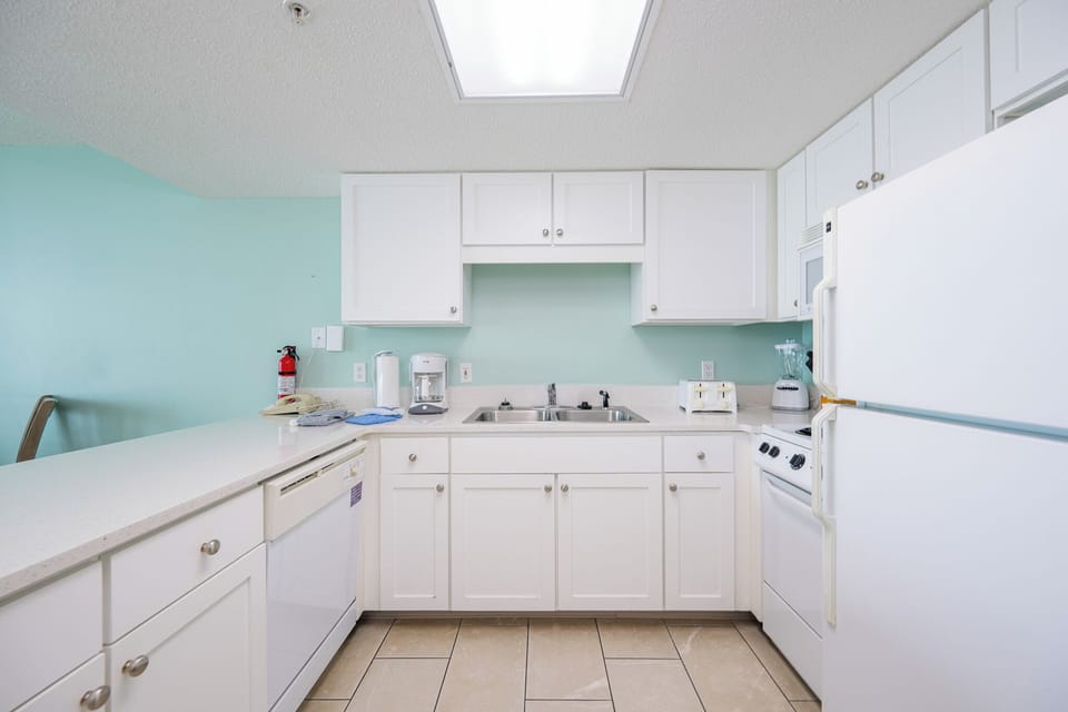 Discover a hotel kitchen that creates the perfect beach getaway with plenty of appliances and extras for convenience