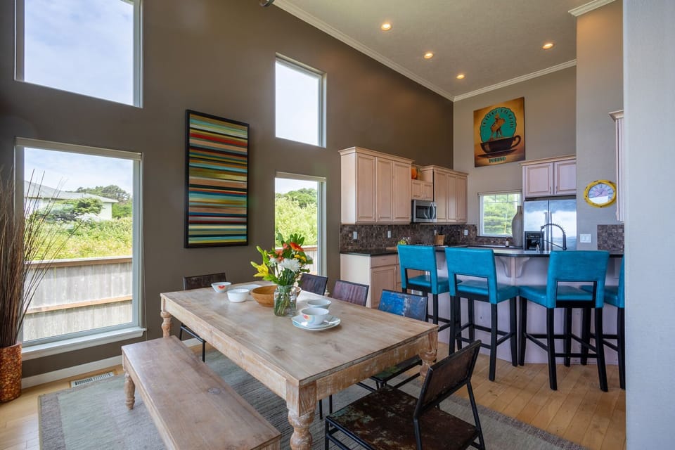 An open floor plan and ocean front view in the downstairs great room.