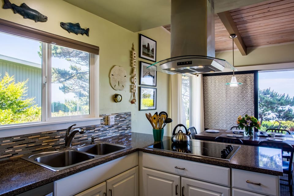 Clean modern efficiency, the kitchen is lovely.