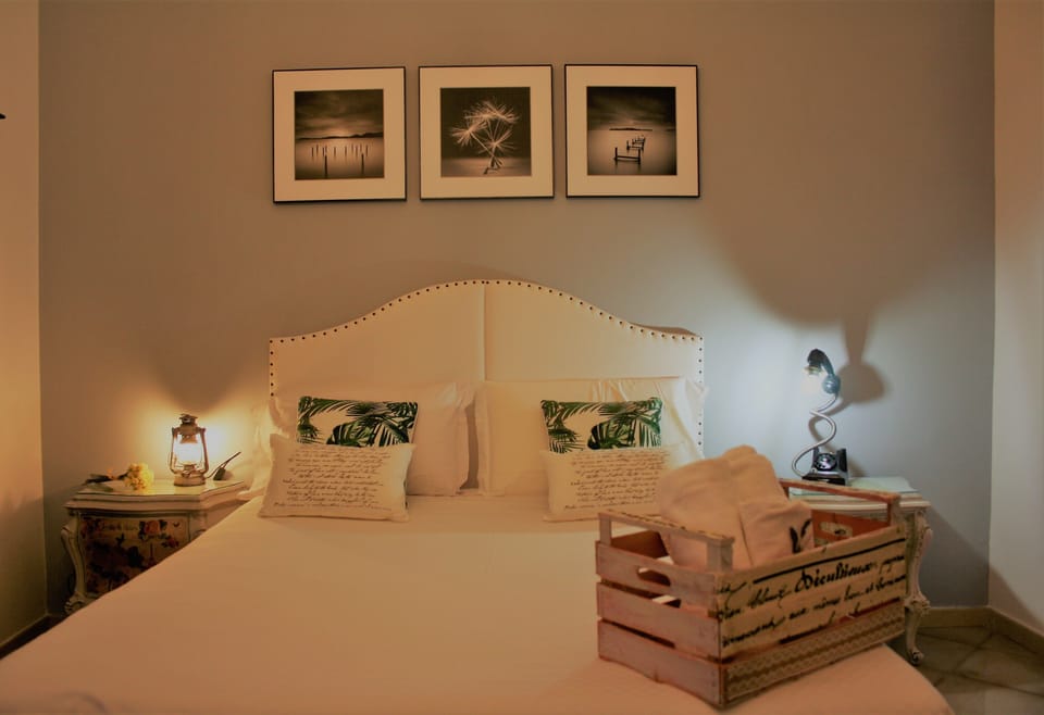 Desk, laptop workspace, blackout drapes, iron/ironing board