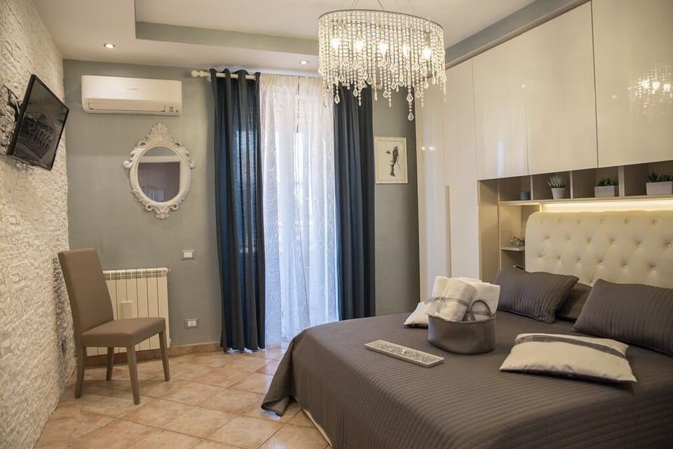 Superior Apartment, Kitchenette | Down comforters, in-room safe, individually decorated, desk