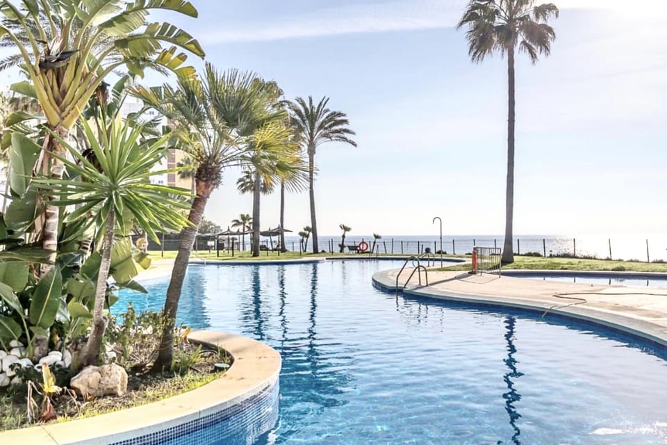 2 outdoor pools, pool umbrellas, sun loungers