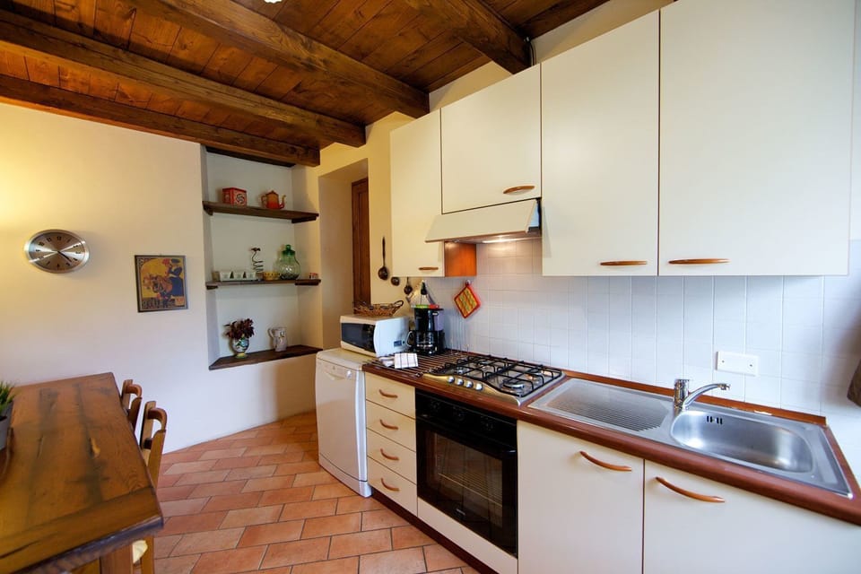 Villa, 4 Bedrooms | Private kitchen | Full-size fridge, microwave, oven, stovetop