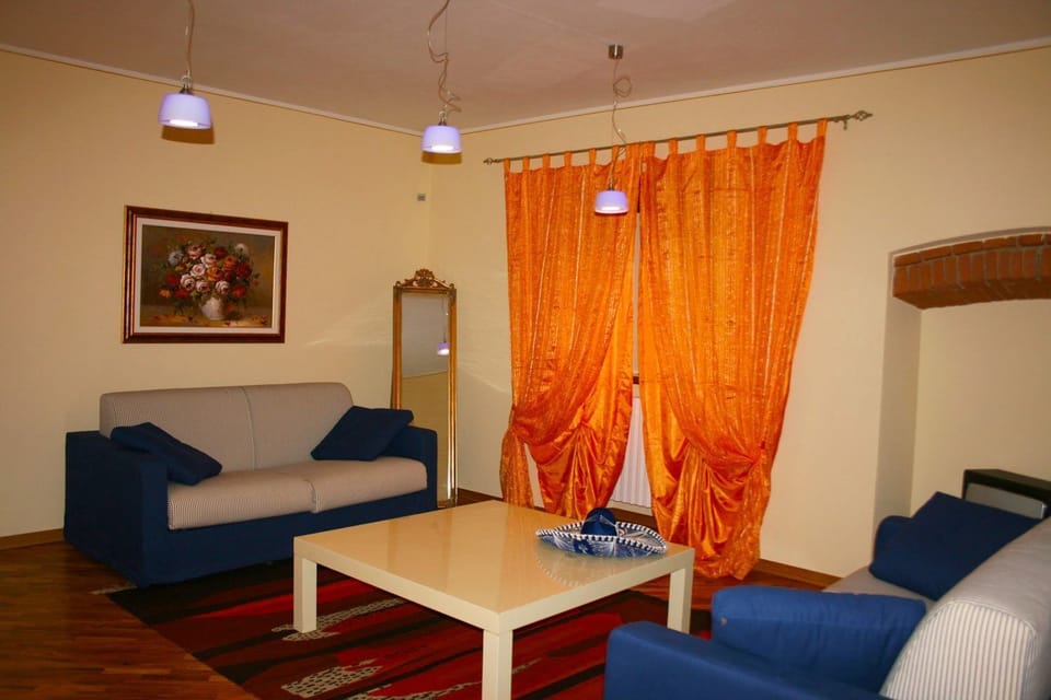 Villa, 4 Bedrooms | Living area | Flat-screen TV, fireplace