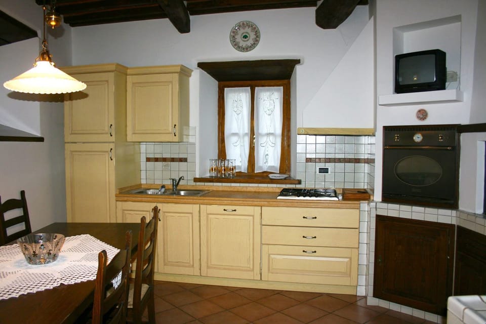 Villa, 4 Bedrooms | Private kitchen | Full-size fridge, microwave, oven, stovetop
