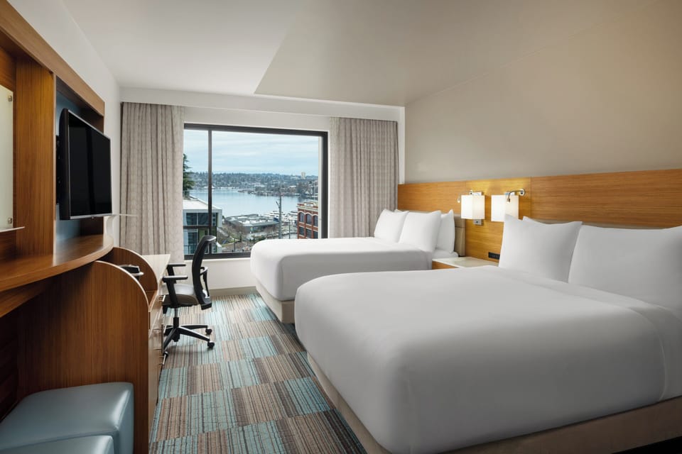 Standard Room, 2 Queen Beds, City View | Egyptian cotton sheets, premium bedding, pillowtop beds, in-room safe