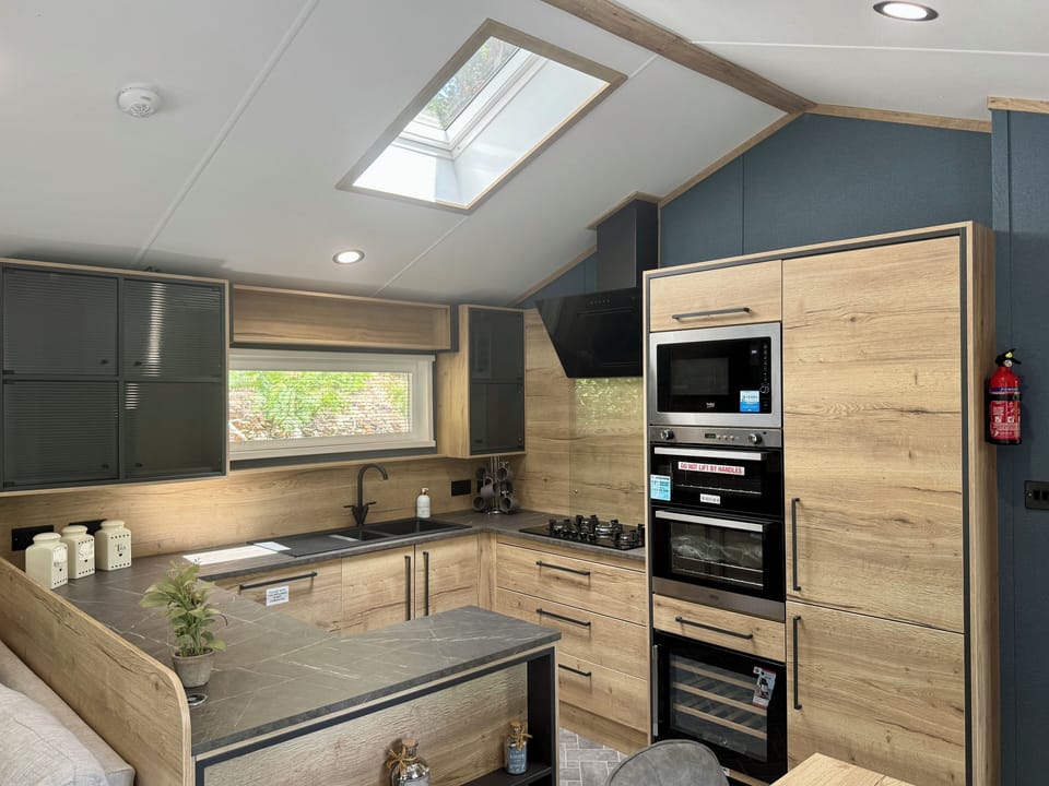 Waterfall Lodge 2 bedroom-No Pets | Private kitchen | Full-size fridge, microwave, oven, stovetop