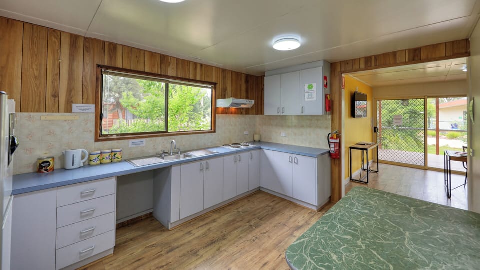 Fridge, microwave, stovetop, cookware/dishes/utensils