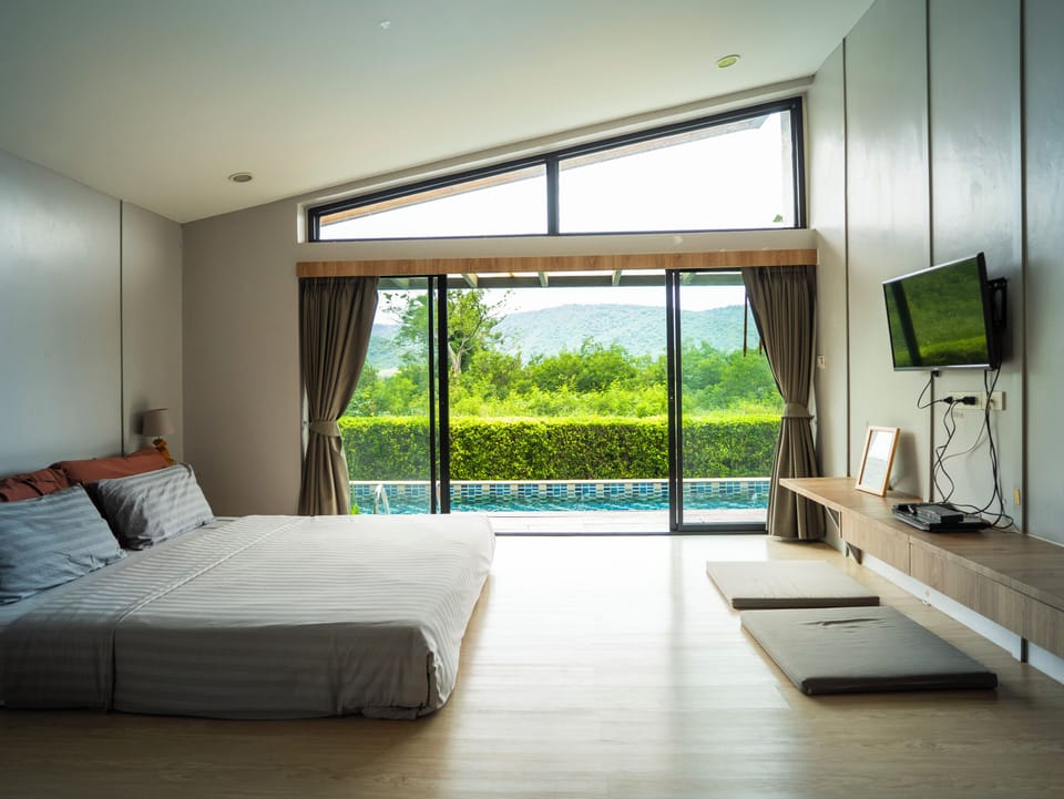 Pool Access Cottage | Minibar, individually furnished, desk, blackout drapes