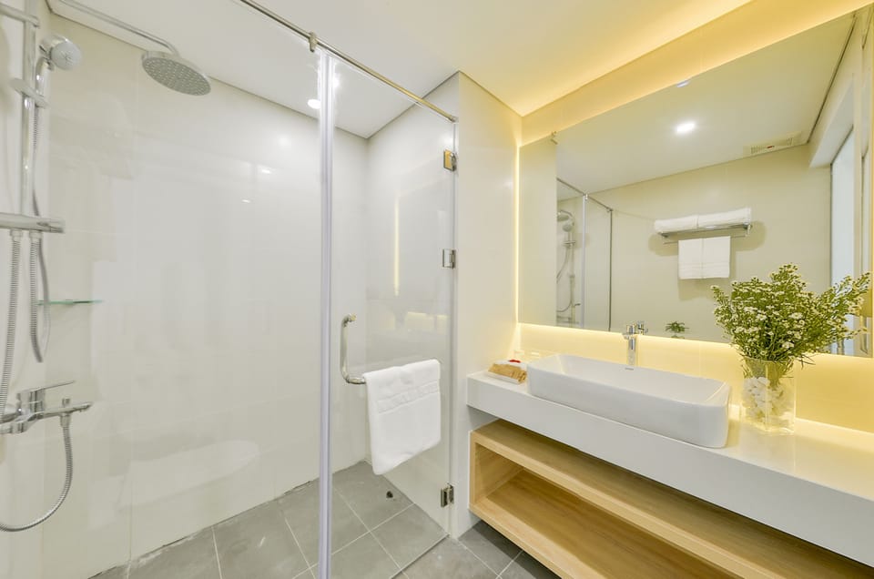 Shower, free toiletries, hair dryer, slippers