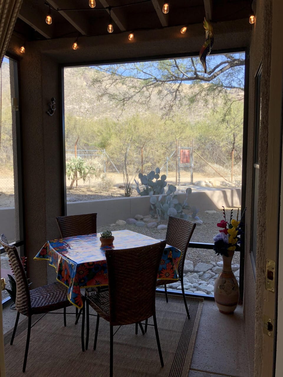 Private screened-in patio at edge of community. Private trailhead entrance gate.
