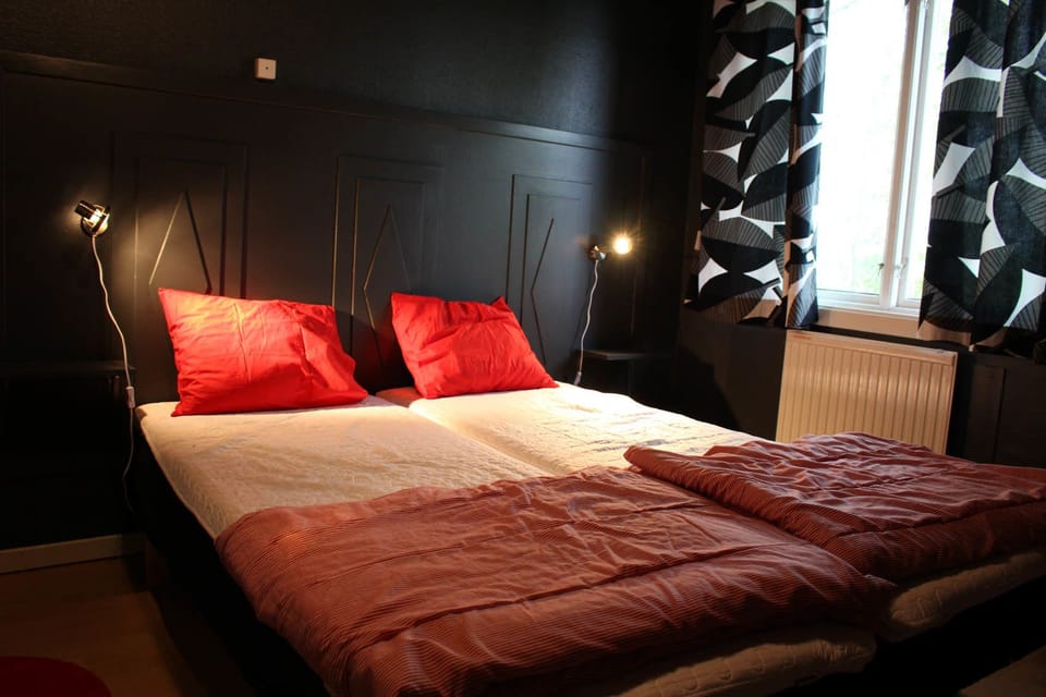 Desk, blackout drapes, iron/ironing board (on request), WiFi (free)