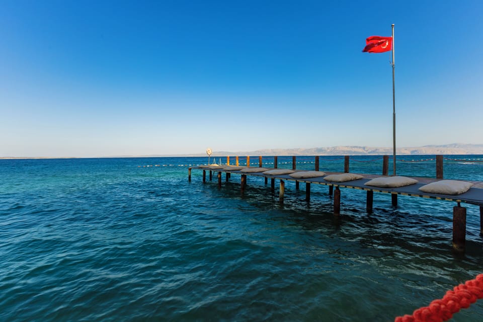 Private beach, free beach shuttle, sun loungers, beach umbrellas