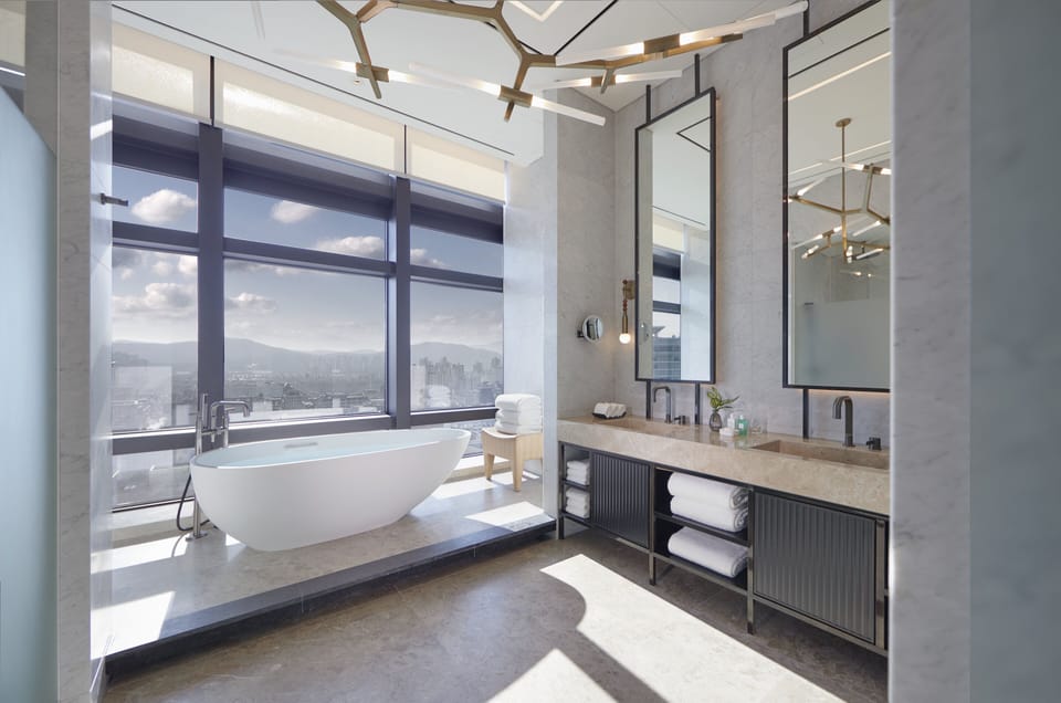 Suite (Ambassador) | Bathroom | Separate tub and shower, deep soaking tub, rainfall showerhead