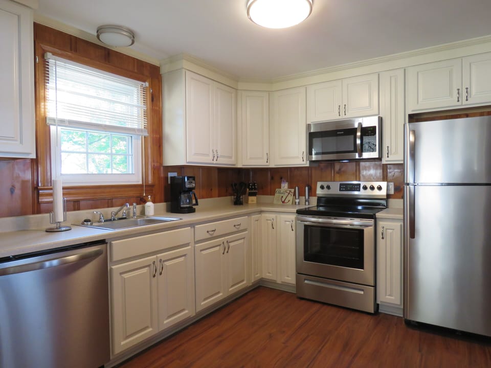 View of Kitchen from entry way. Remodel completed May 2018. 