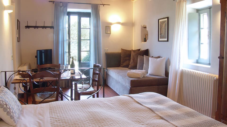 Junior Suite, Garden View | Premium bedding, down comforters, minibar, in-room safe