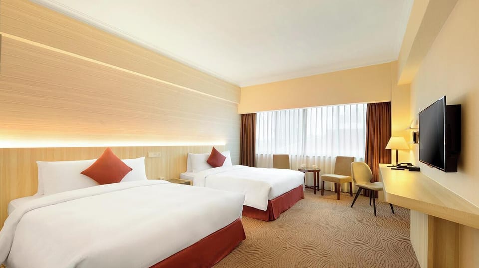 Family Room | Premium bedding, in-room safe, desk, blackout drapes