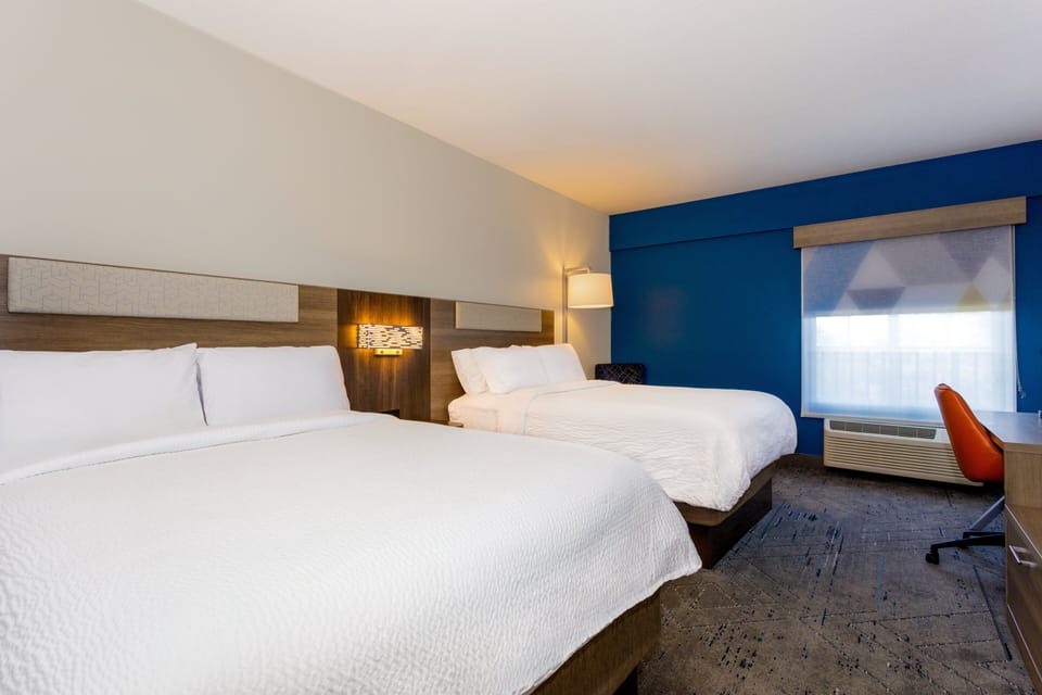 Standard Room, 2 Queen Beds | In-room safe, desk, laptop workspace, blackout drapes
