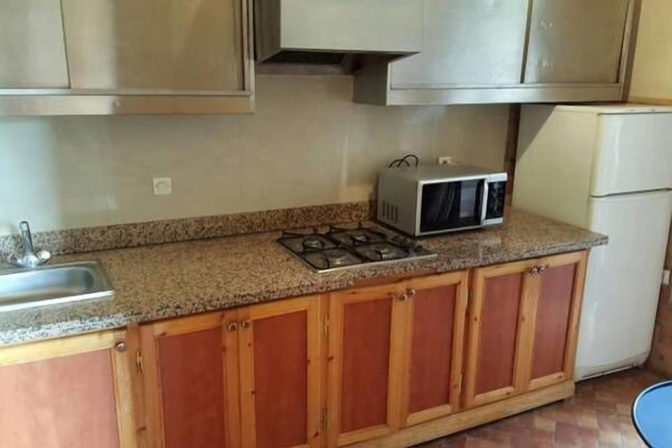 Deluxe Triple Room, Accessible, Pool View | Private kitchenette | Fridge, microwave, stovetop, coffee/tea maker