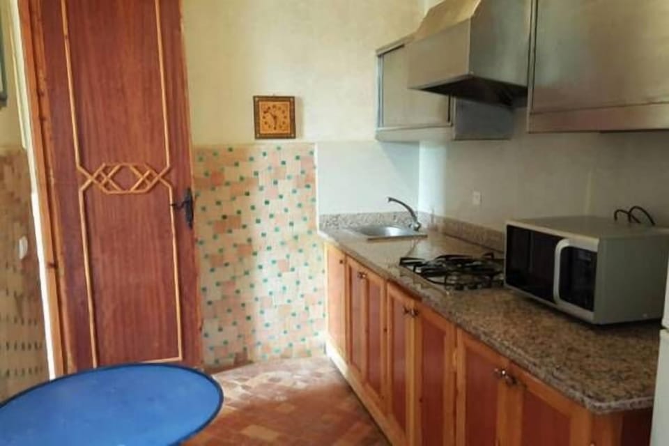 Deluxe Triple Room, Accessible, Pool View | Private kitchen | Fridge, microwave, stovetop, coffee/tea maker