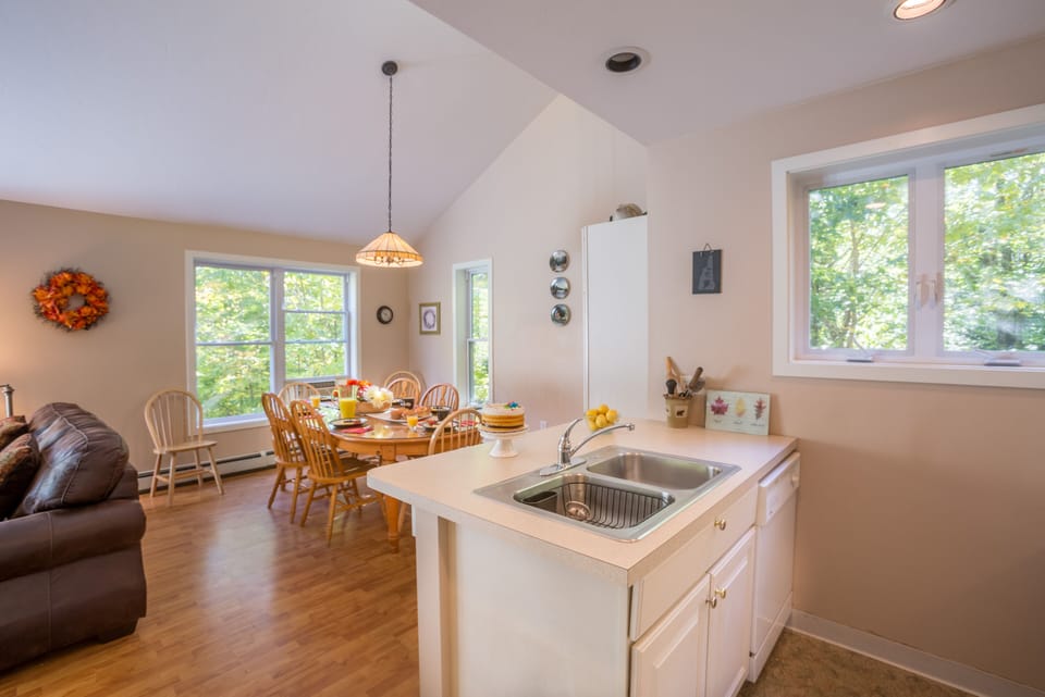 Cook in the kitchen while friends and family are close by
