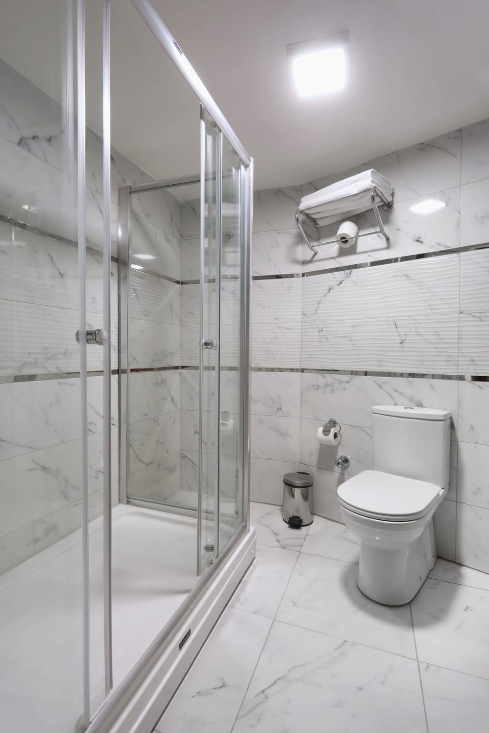 Shower, free toiletries, hair dryer, slippers
