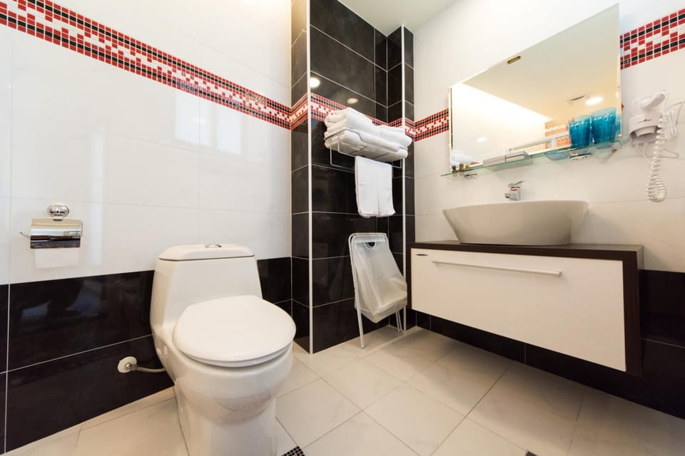 Shower, free toiletries, hair dryer, slippers