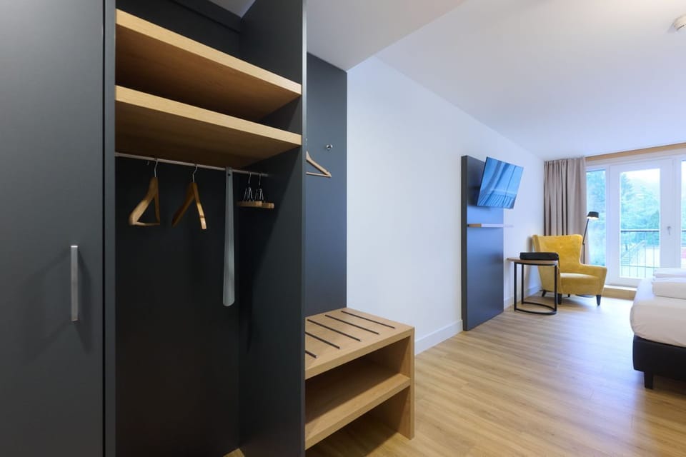 Superior Double Room | Living area | 43-inch flat-screen TV with satellite channels, TV
