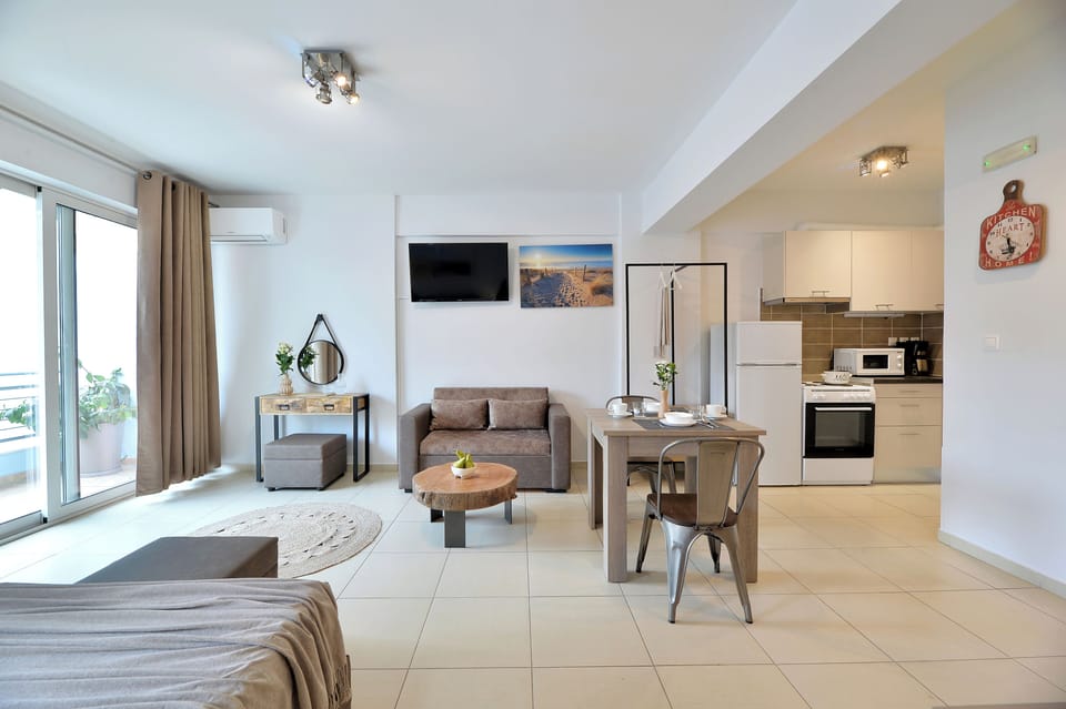 Superior Apartment | Living area | 40-inch flat-screen TV with satellite channels, TV, Netflix