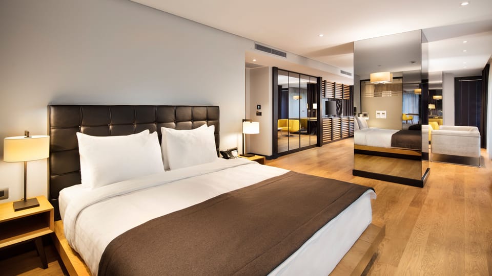 Privacy Suite | Minibar, in-room safe, desk, laptop workspace