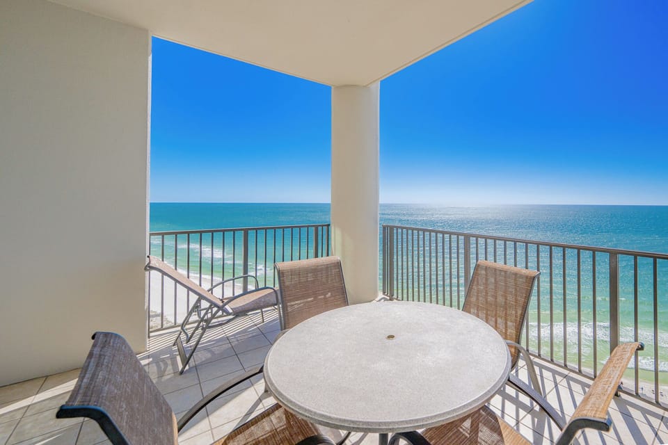 Experience astonishing views from the balcony, complete with a round table and comfortable seating for relaxation