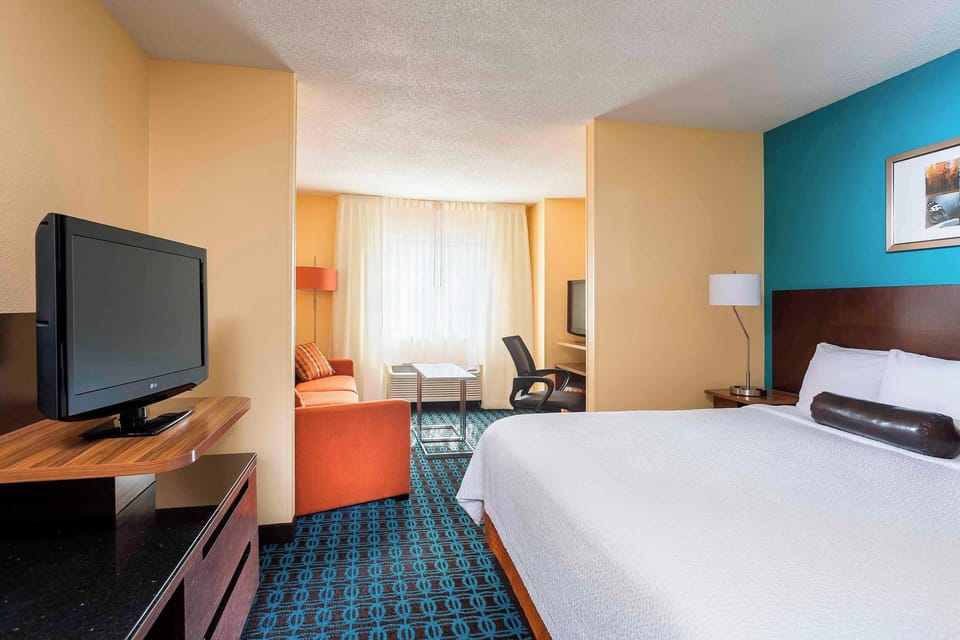 Premium bedding, desk, blackout drapes, iron/ironing board