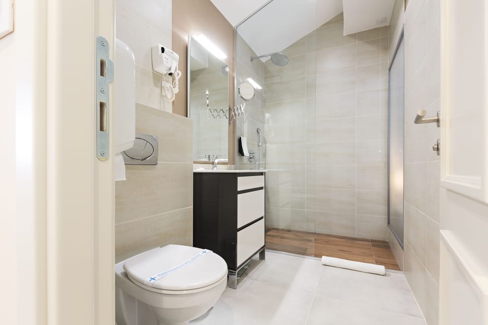 Shower, free toiletries, hair dryer, bathrobes