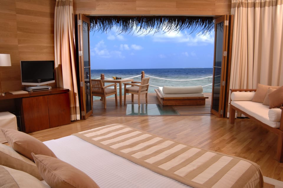 Over water villa With Jacuzzi  | Minibar, in-room safe, desk, blackout drapes