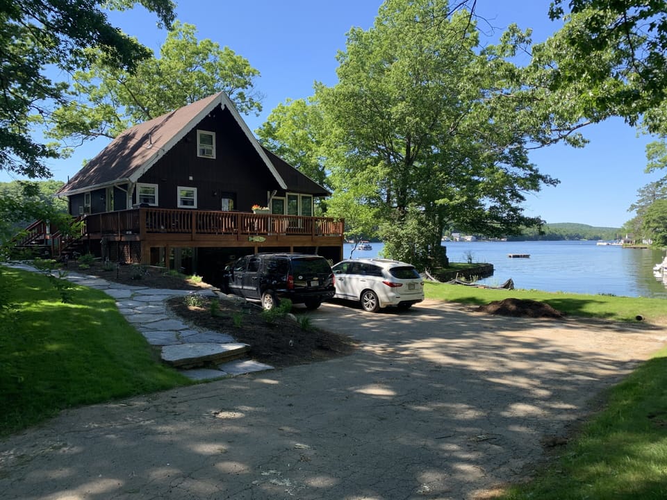 New stone walkway and landscaping  Parking for 4 cars comfortably.