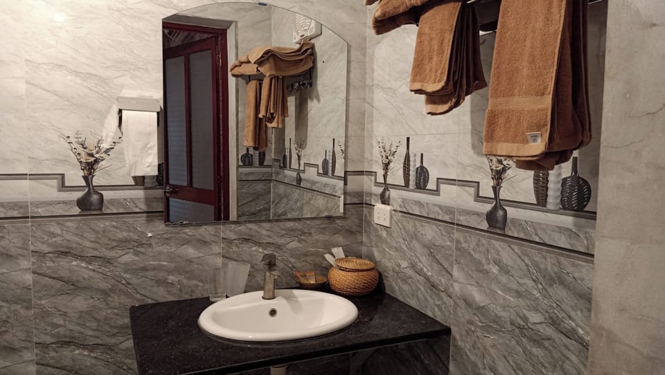 Shower, free toiletries, hair dryer, slippers